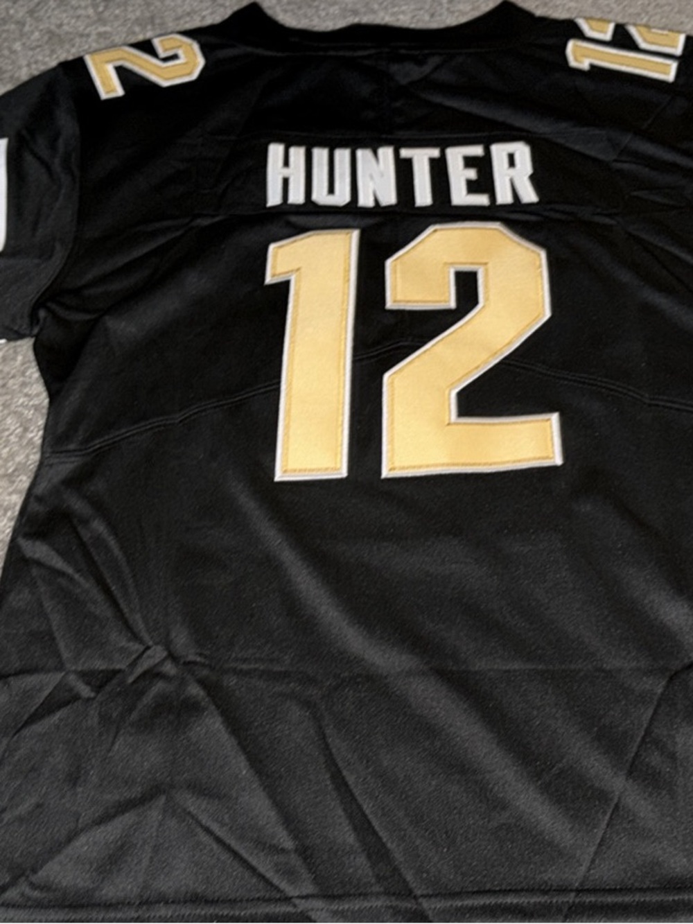 Nike Men’s Black and Gold Hunter #12 Jersey